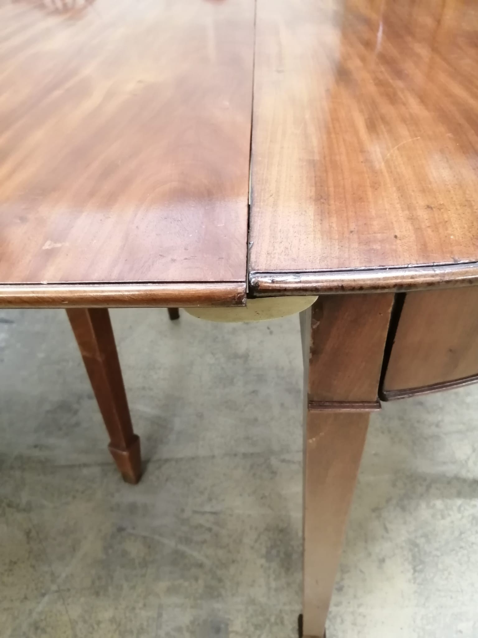 A George III mahogany D end extending dining table 304cm extended, two spare leaves, depth 122cm, height 74cm
